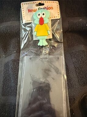 Cute Cartoon Mint Green Badge Reel with Yellow Outfit